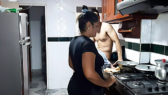 A Mature Woman From Colombia Performs Oral Sex On A Young Man In The Kitchen