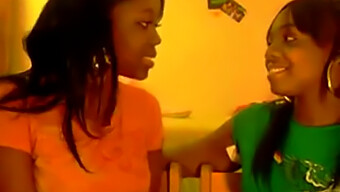 Ebony Women Indulge In Lesbian Kissing