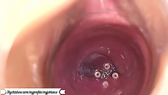 Watch As A Woman Pleasures Herself With A Camera In Her Vagina